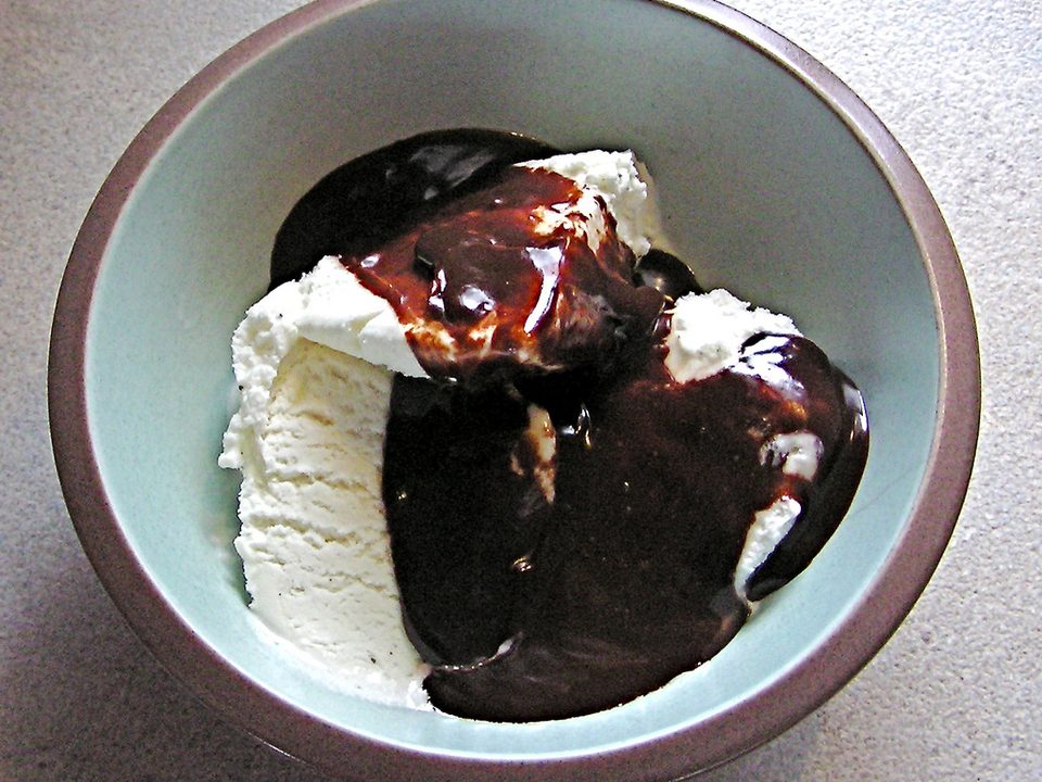 Chocolate sauce over ice cream