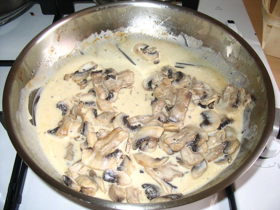 Creamy mushroom sauce in a frying pan